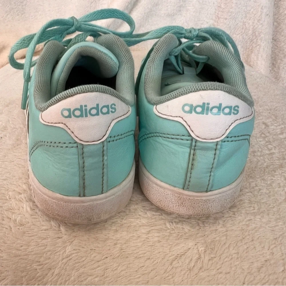 Adidas teal blue kids sneakers with white stripes, size 4, preowned